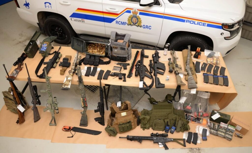 A collection of weapons that RCMP said they seized during protests near Coutts, Alta. (RCMP)