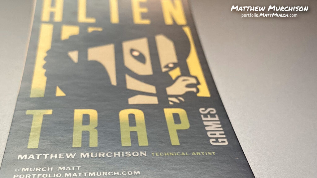 Alientrap Games business card with my personal socials on it.